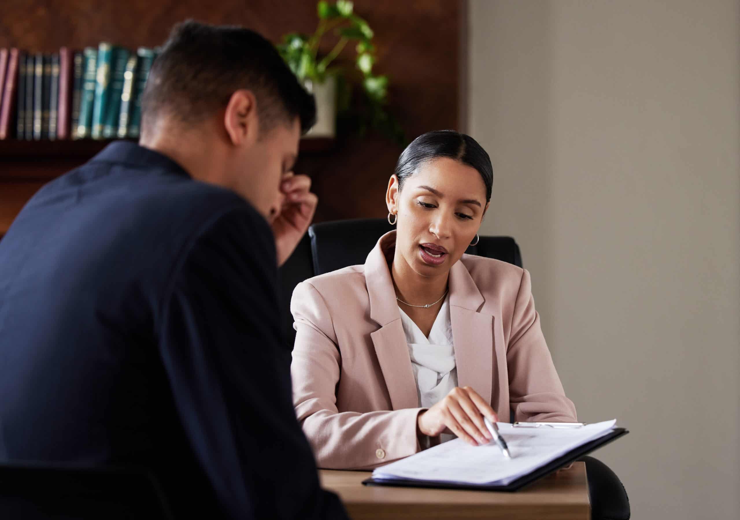Lawyers discussing strategy in an e-scooter accident.