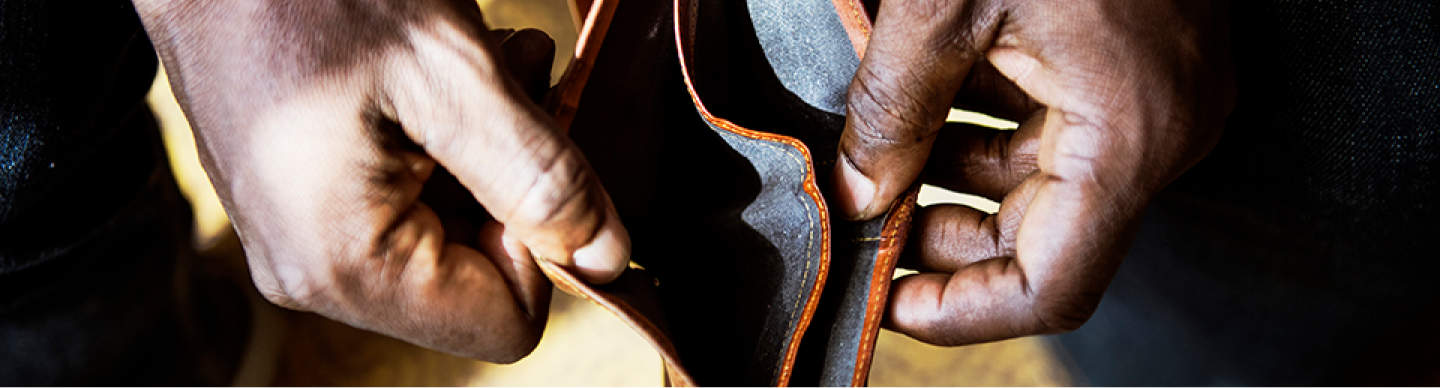 a person holding an empty wallet