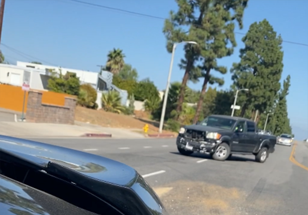 Defendant's car in the middle of a Los Angeles street after the rear end collision.