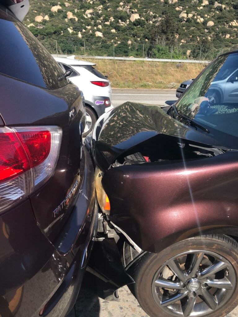 View of the two struck vehicles after the car accident.