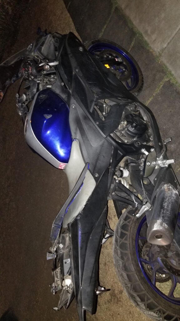 The rear and front of the motorcycle were badly damaged.