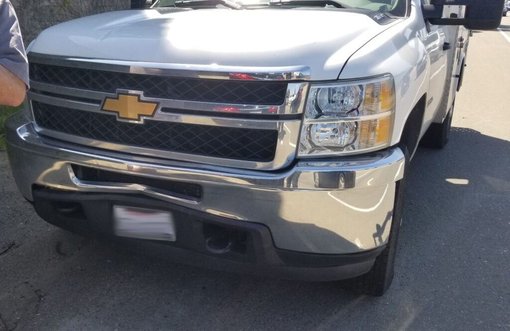 The defendant's car also suffered front-end damage as a result of the brutal impact.