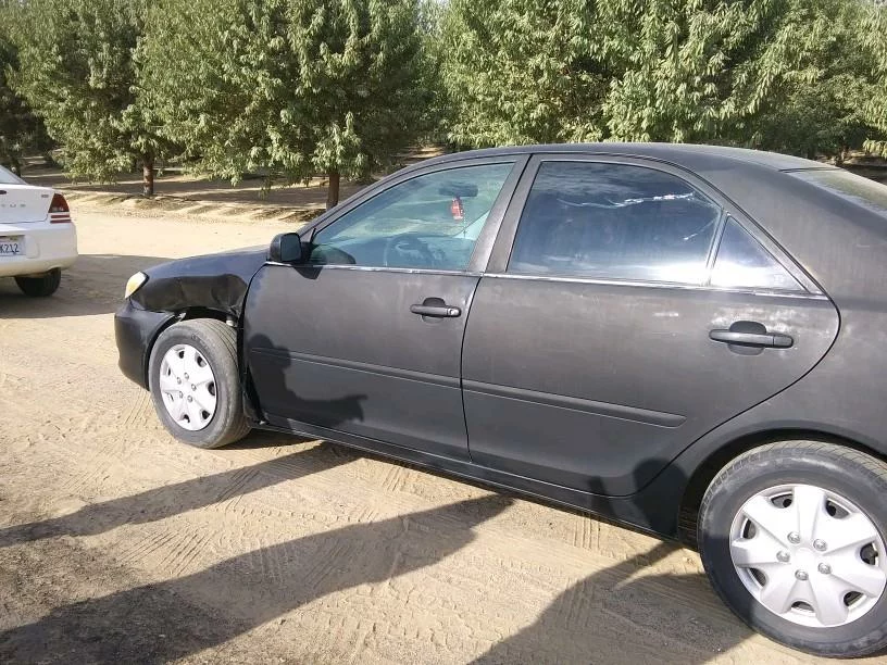 Side view of cars involved in rear-end accident.