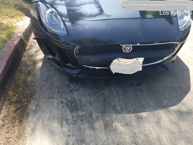 Front of the defendant's Jaguar after the traffic accident.