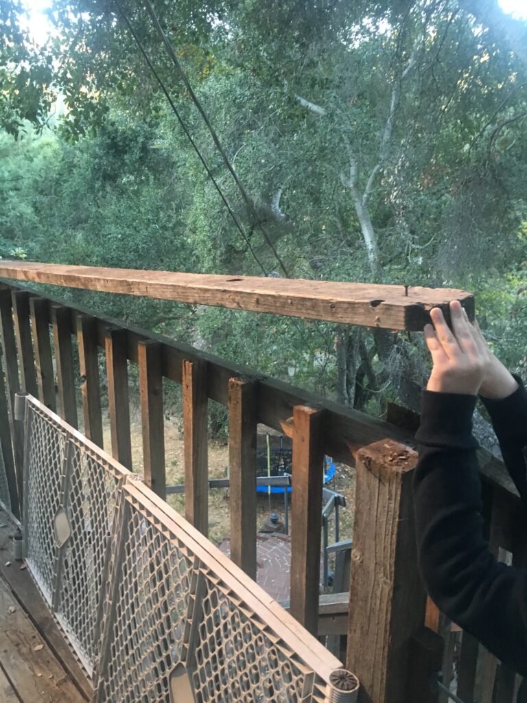 The deck handrail broke after a fall.