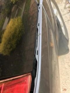 The rear end collision caused damage to the rear bumper and injuries to the victim.