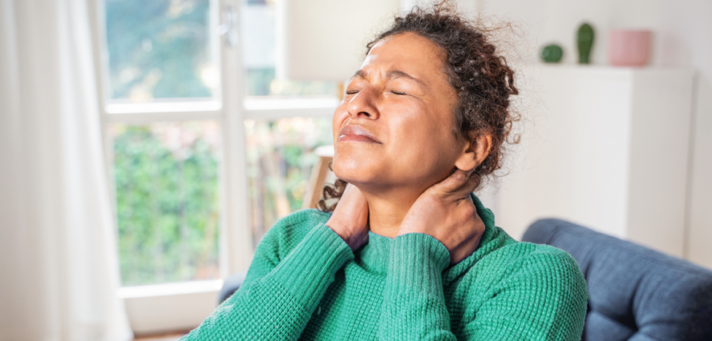 Woman suffering back pain after a car accident