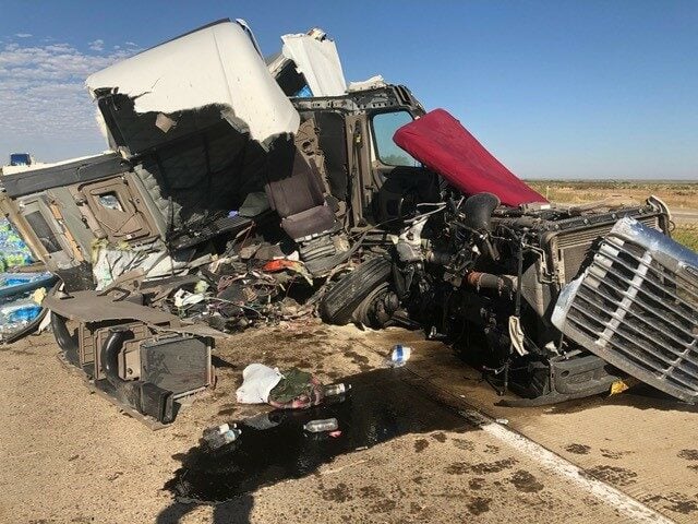 The cab of the defendant driver's truck was severely damaged.