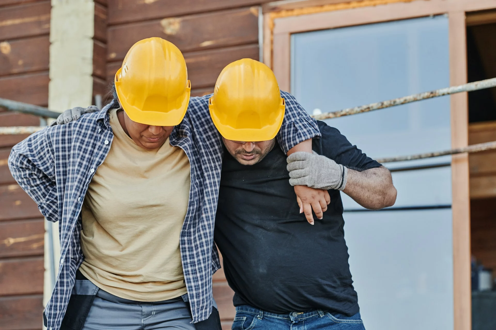 a worker supporting an injured colleague