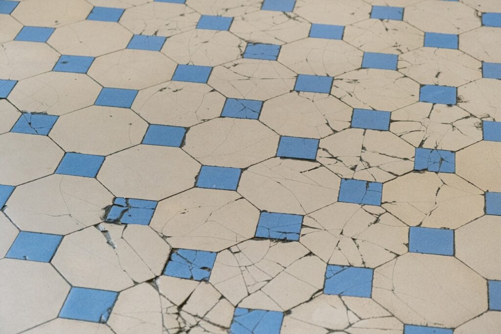 Cracked tiles inside a store