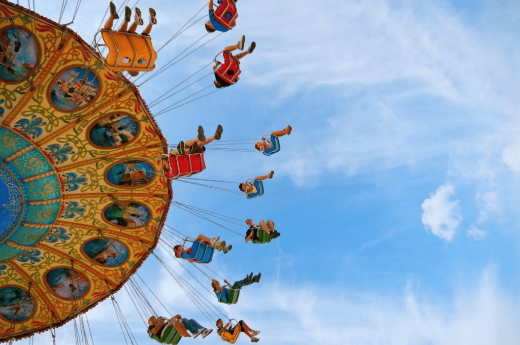 people riding an amusement park ride