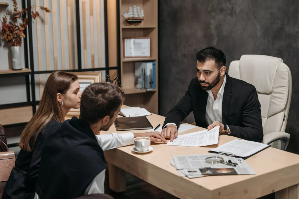 a lawyer talking to his clients