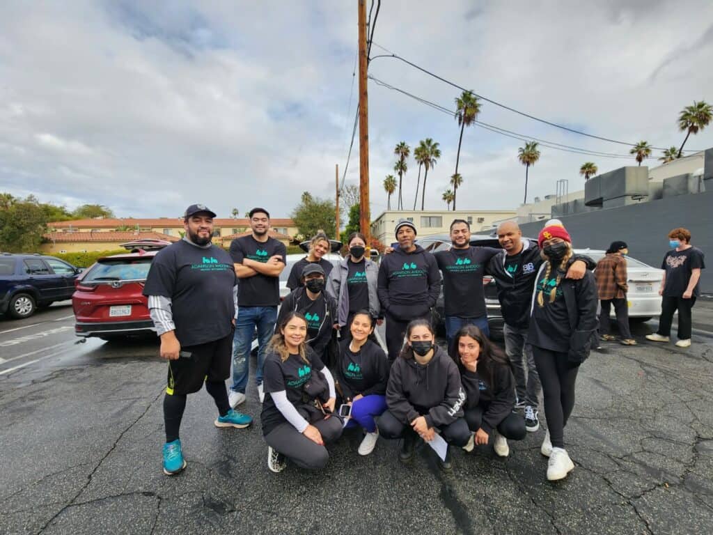 adamson ahdoot employees dressed in adamson ahdoot clothes