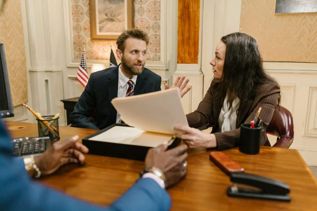 A lawyer and client talking together