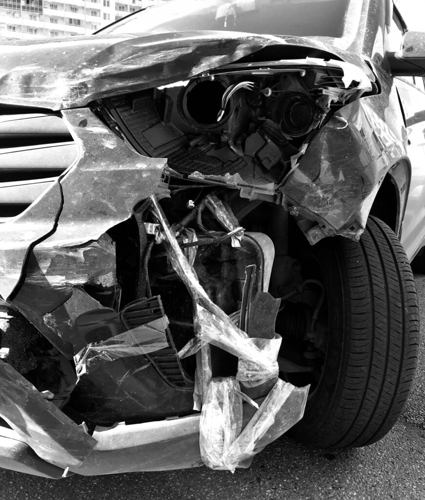 The accident, caused after running a traffic light, left the car totaled.