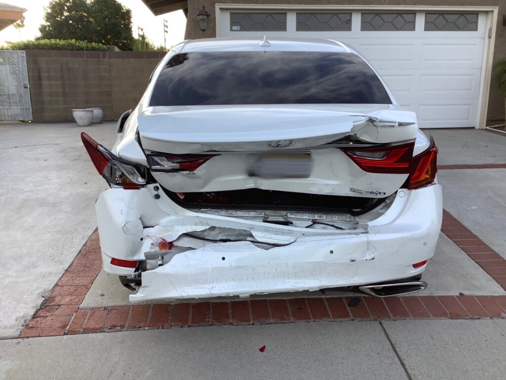 The rear of the victim's car was completely damaged after the accident.