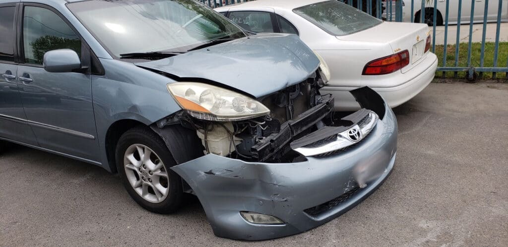 Front of defendant's car blown out in Fresno car accident.