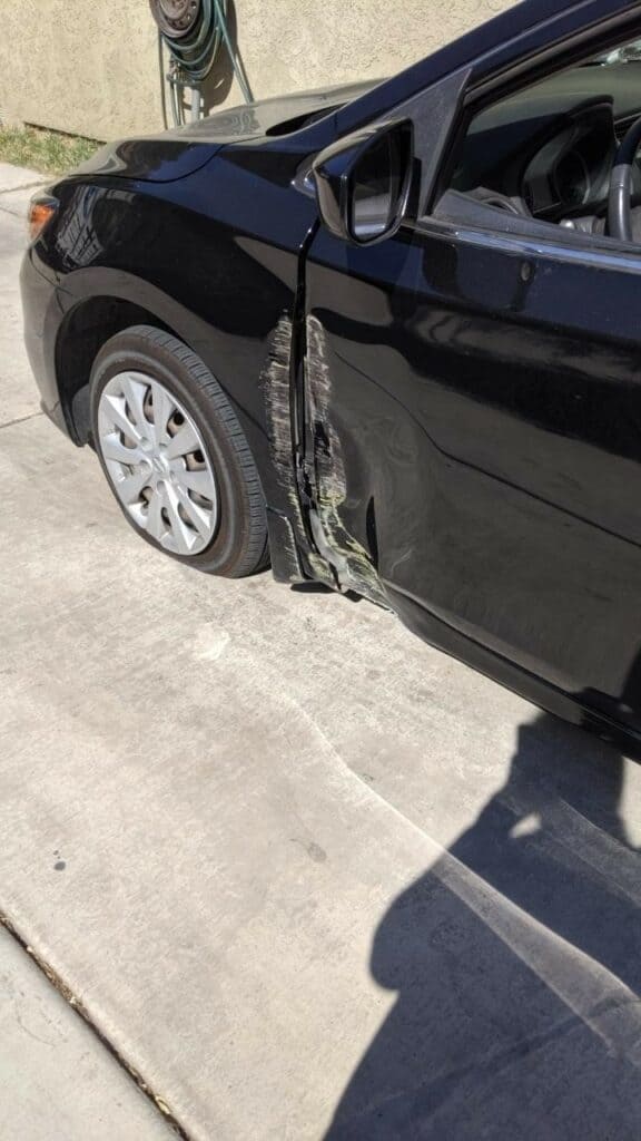 The left front tire of the car was struck in a traffic light accident.