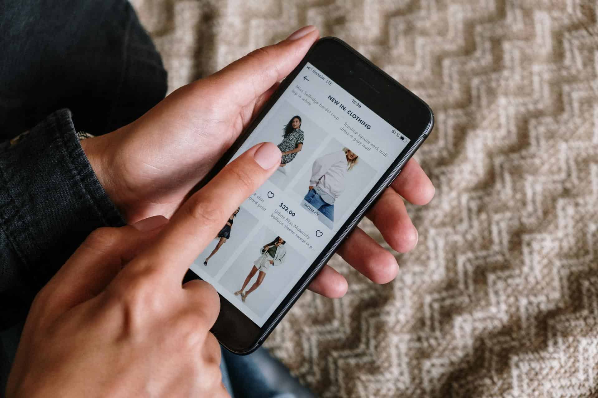 a person shopping online on a smartphone