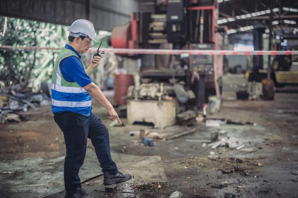 Man points to the ground after a wrongful death accident.