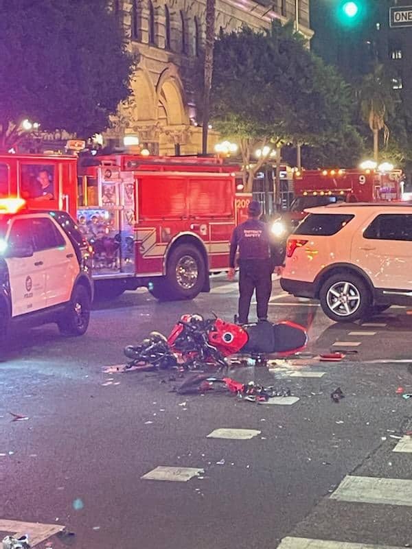 Scene of motorcycle accident at an intersection.