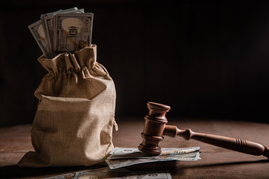 gavel and money compensation