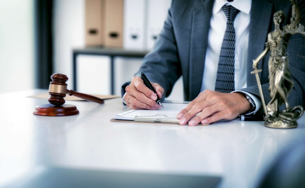 lawyer signing