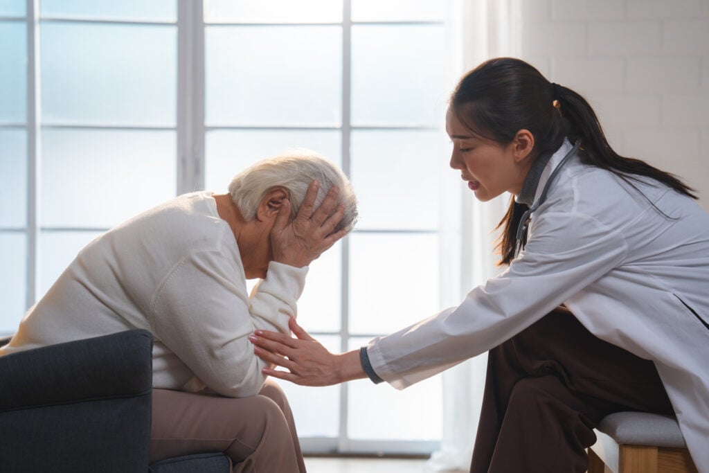 State worker assists an elderly victim of financial abuse.