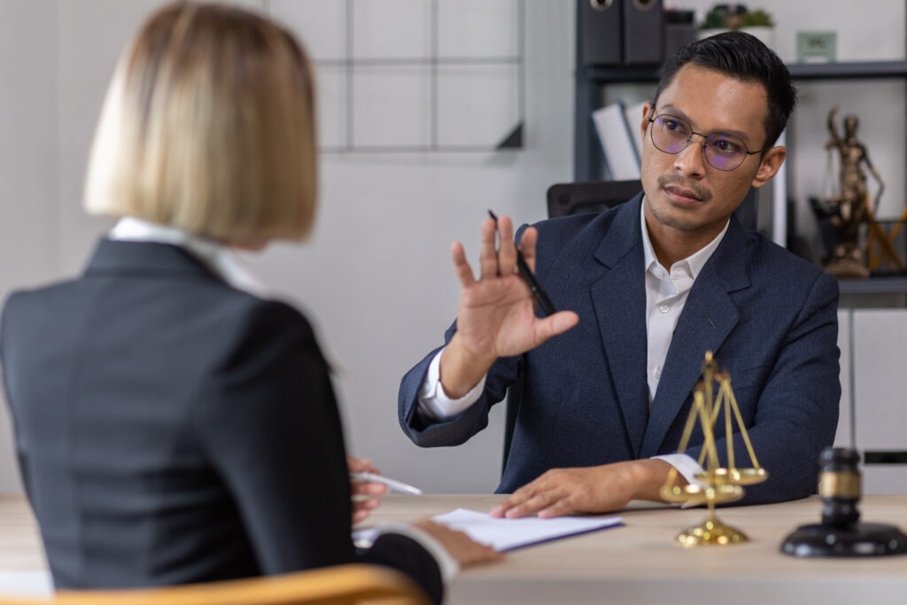 Lawyer arguing a case in his office.