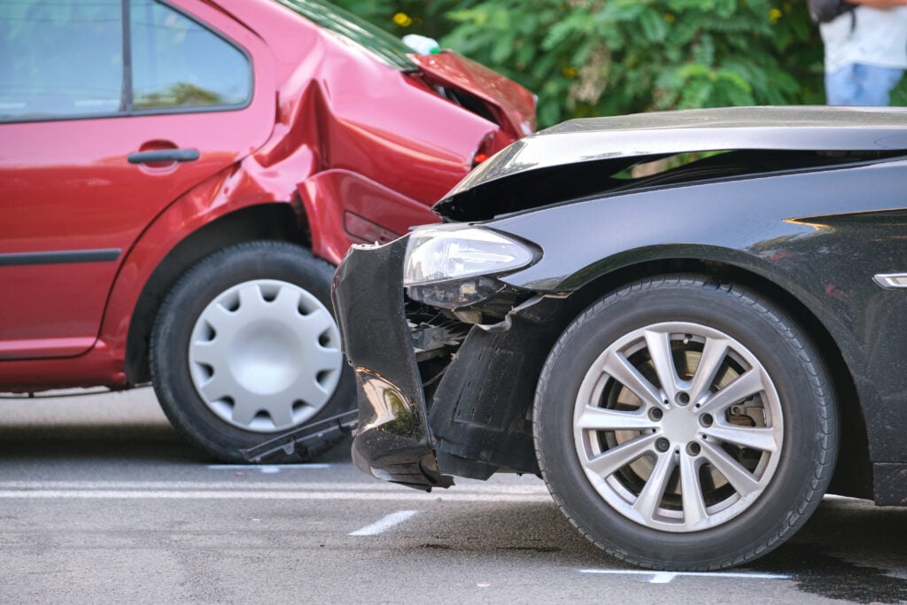 Two cars after suffering a t-bone collision, one of the most common types of accidents.