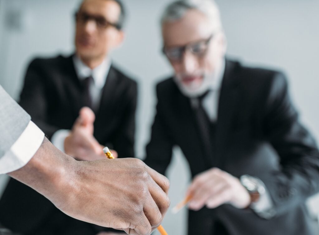 Lawyers discussing the elements of negligence in an injury case.