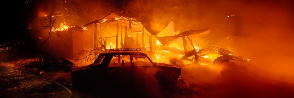 A house on fire following the Eaton Fire in California.