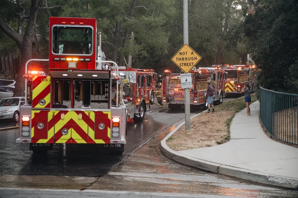 Fire trucks lined up during an emergency wildfire evacuation response.